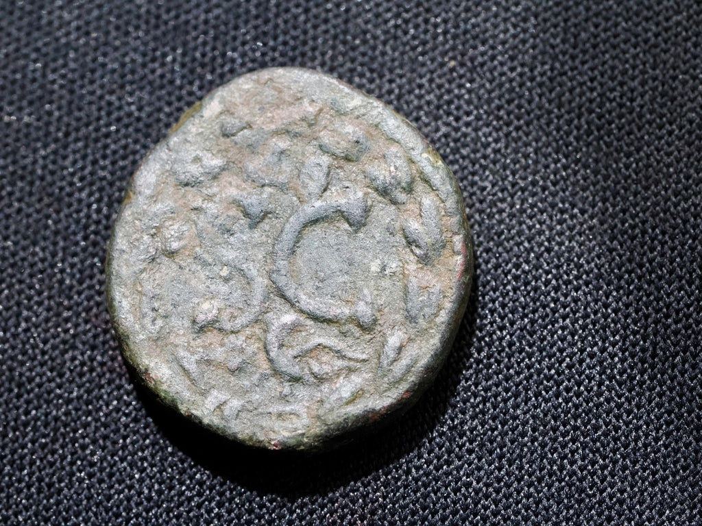 ELAGABALUS ae19 , 218-222 AD. SC in wreath. Eagle below,  Syria1