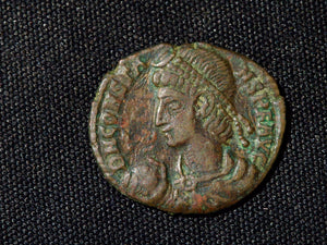 Constans ae 3 soldier dragging captive from hut