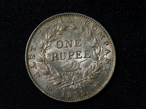 East India company 1835 one rupee. RS on truncation, thin letters-excellent