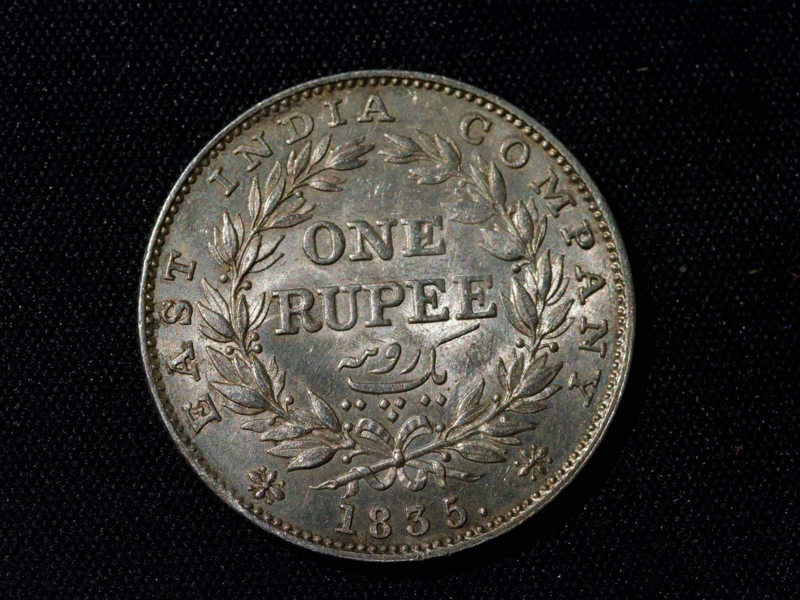 East India company 1835 one rupee. RS on truncation, thin letters-excellent0