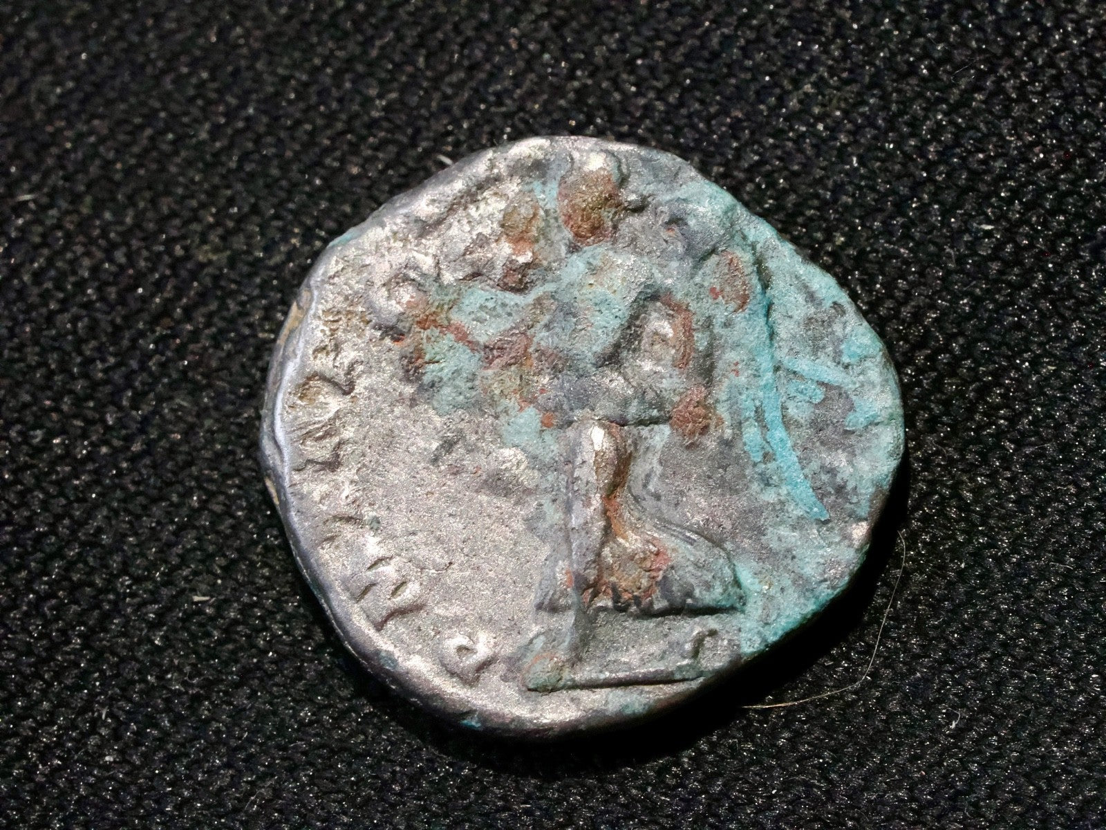 Septimus Severus denarius- Victory walking left,  holding wreath and palm1
