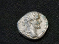 Septimus Severus denarius- Victory walking left,  holding wreath and palm0