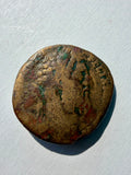 Commodus sestertius. Liberalitas-Commodus seated on chair