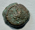 CYRENAICA 3rd c BCE .Ptolomy VII AE11. Turreted female bust-Caps of Dioscuri