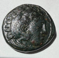 Kassander-305-297 BC.Head of young Hercules facing right/Nude youth riding a horse right AE20 unit