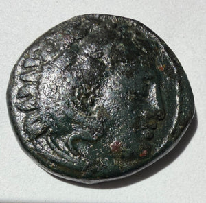 Kassander-305-297 BC.Head of young Hercules facing right/Nude youth riding a horse right AE20 unit