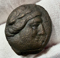 AE19 Thessalian league,Apollo/Athena Itonia striding right