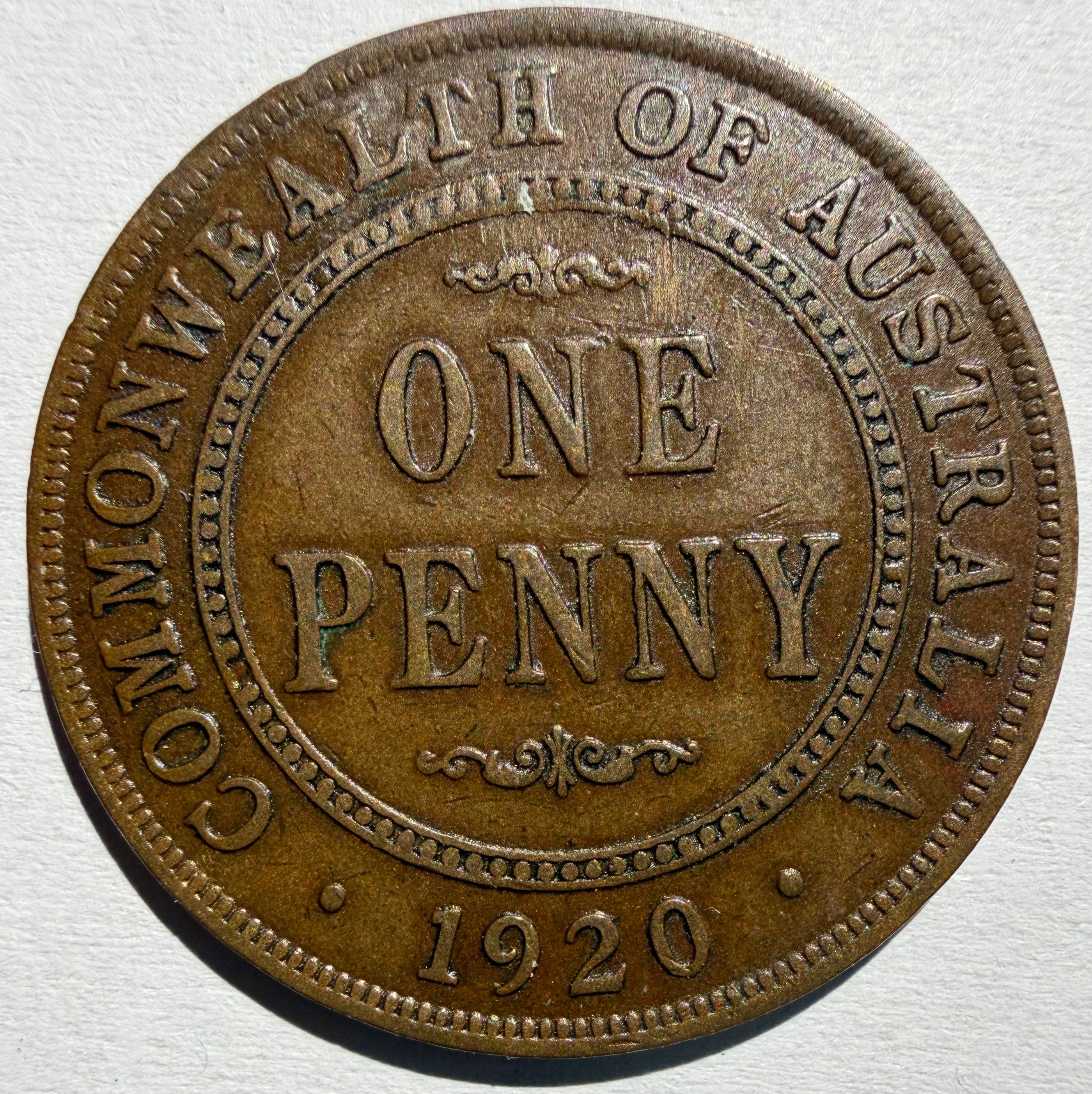 Australia 1920 penny dot over bottom scroll-Indian